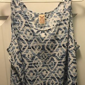 blue and white geometric design sleeveless blouse